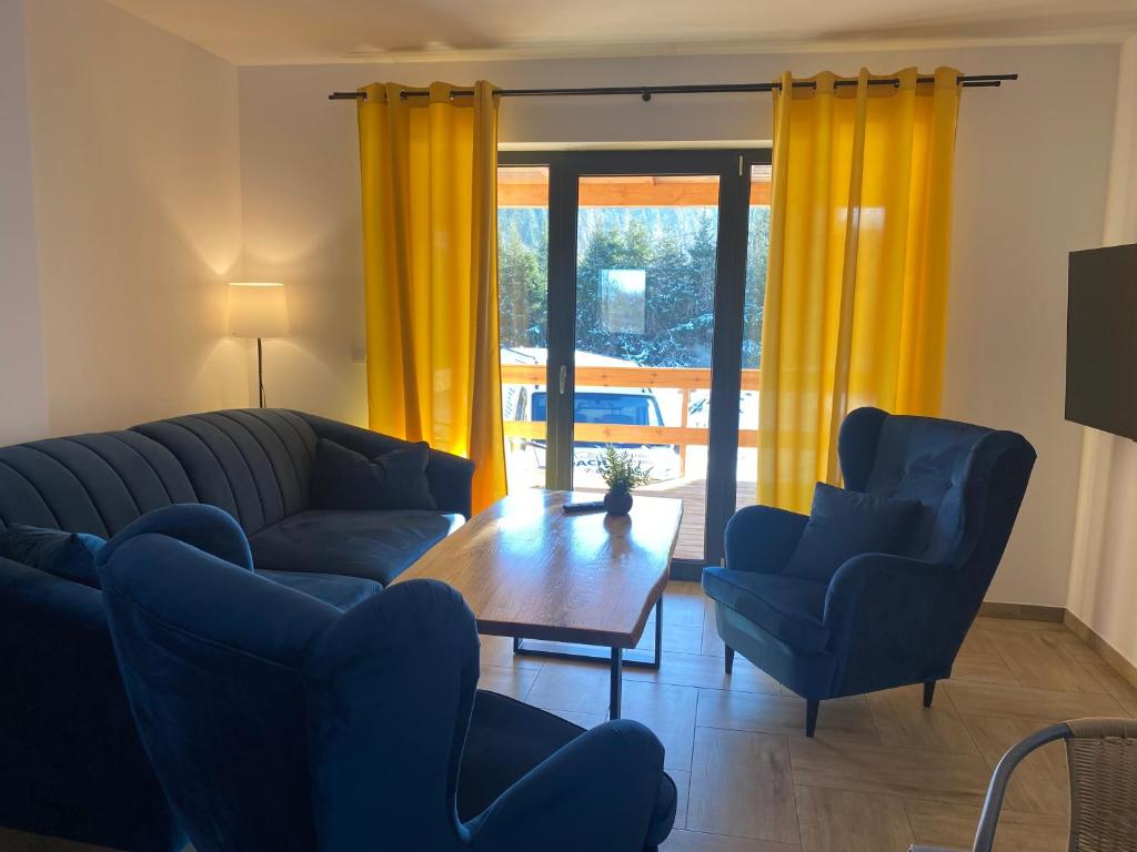 Posezení v ubytování Apartamenty JENDRYCÓWKA