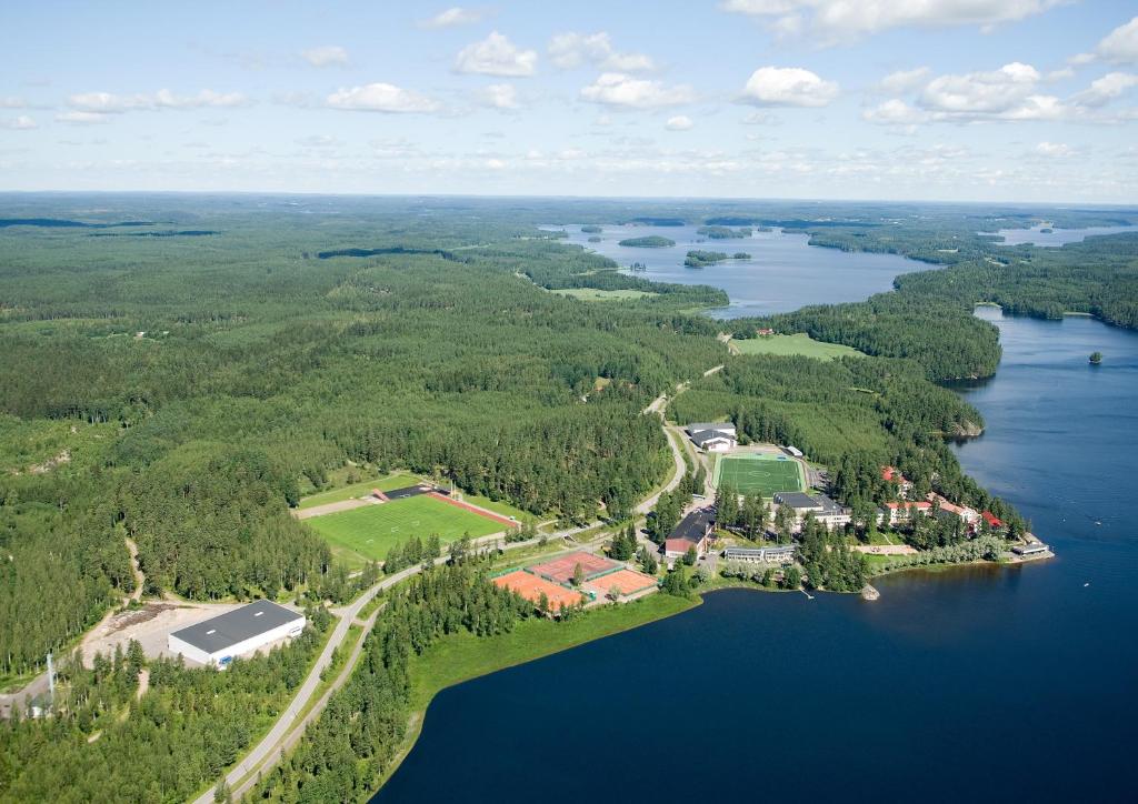 an aerial view of a large island in a lake at Pajulahti Olympic & Paralympic Training Center in Nastola