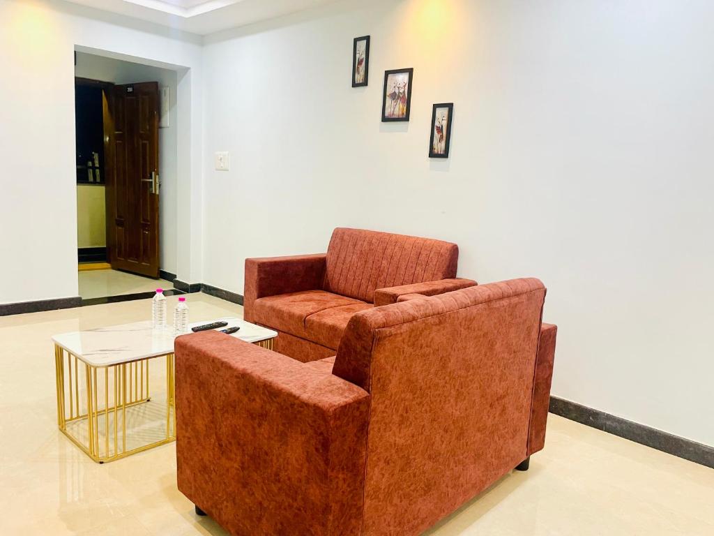 Posezení v ubytování Deccan Suites, Tirupati