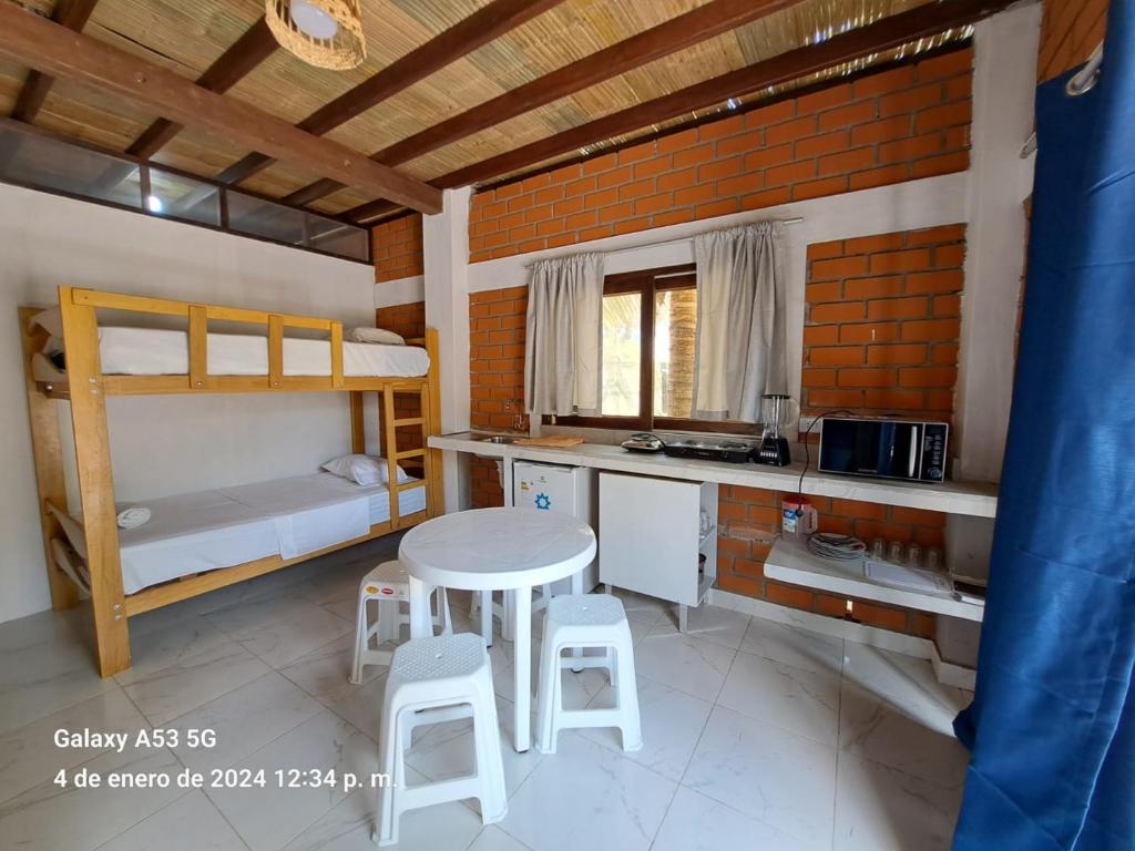 Postel nebo postele na pokoji v ubytování Punta Pacífico Bungalows Máncora