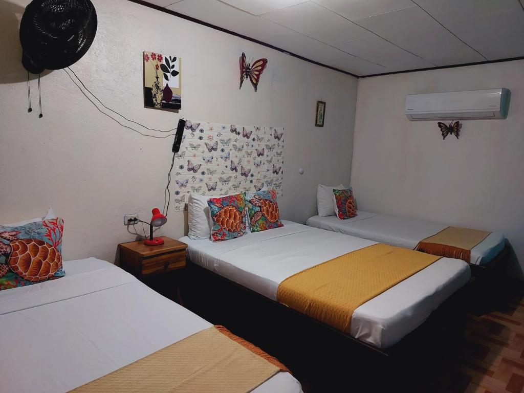 Postel nebo postele na pokoji v ubytování Chinitas Eco Lodge