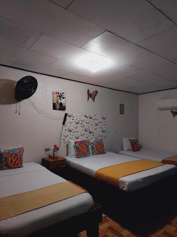 Postel nebo postele na pokoji v ubytování Chinitas Eco Lodge