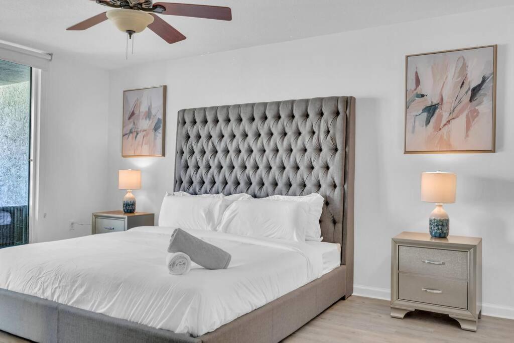 a bedroom with a large bed and a ceiling fan at Stunning 1 BDR 1 BTH • Brickell • Bay & City Views in Miami
