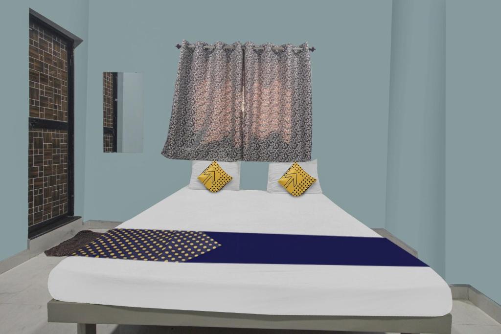 Un ou plusieurs lits dans un hébergement de l'établissement SPOT ON Hotel Welcome Inn
