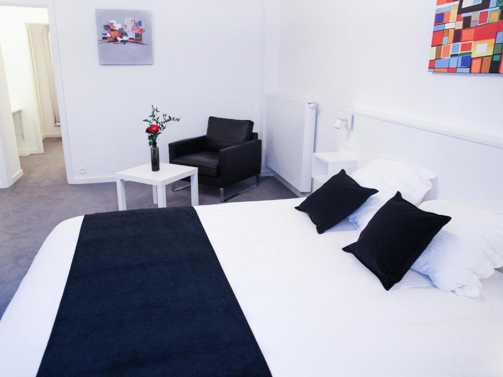 Postel nebo postele na pokoji v ubytování Hotel Satellite