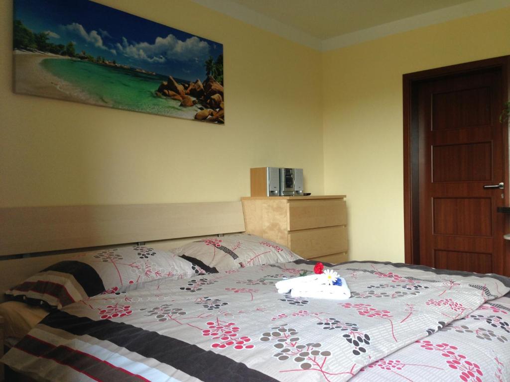Postel nebo postele na pokoji v ubytování Podhájska - Holiday