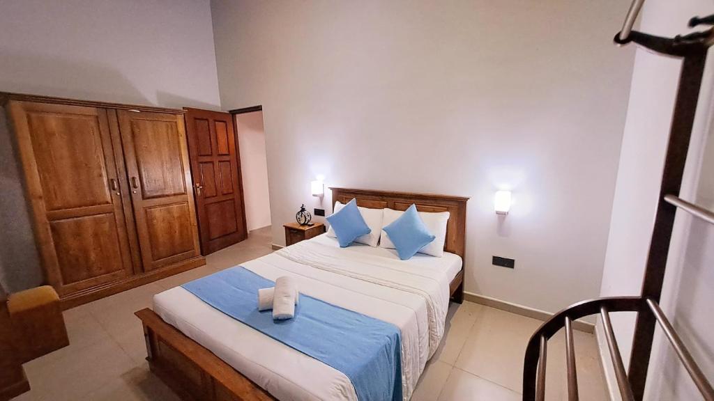 Postel nebo postele na pokoji v ubytování Golden Shower Inn