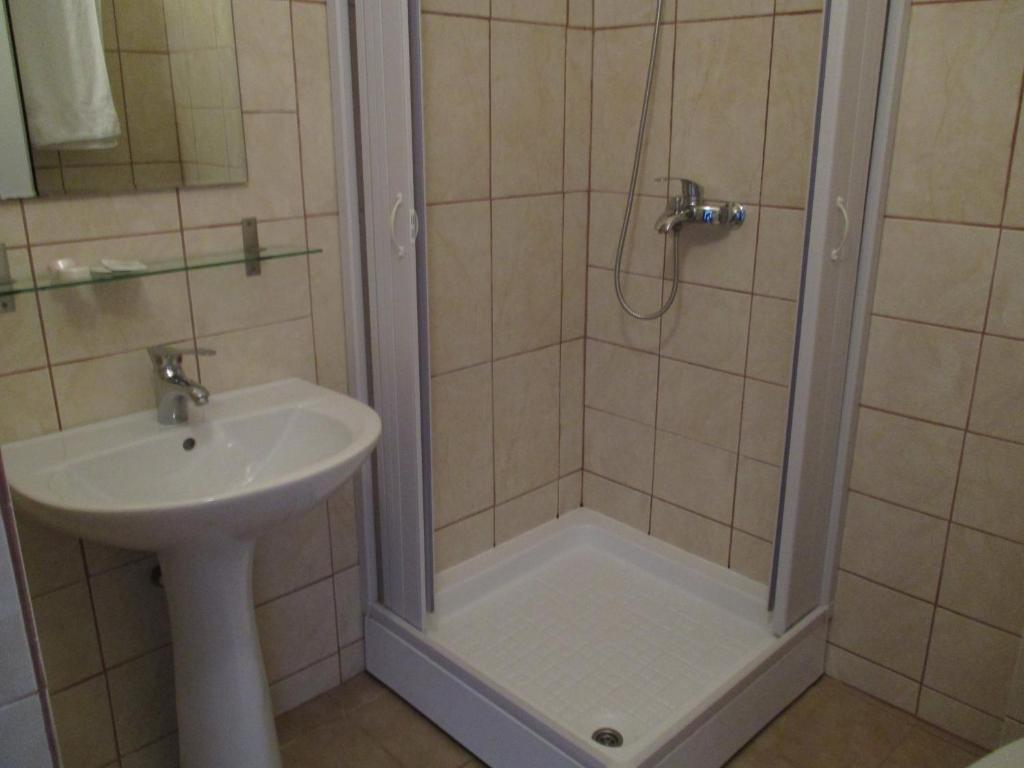 Koupelna v ubytování Hotel Uranus
