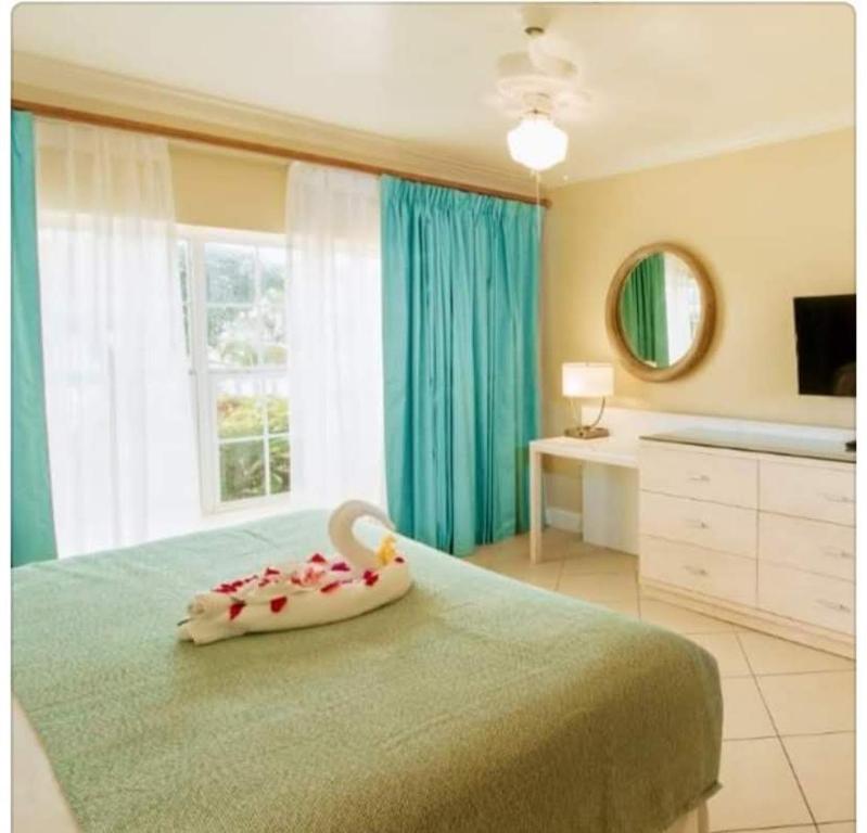Un pat sau paturi într-o cameră la Premium Travel Escapes - Studio Apartment