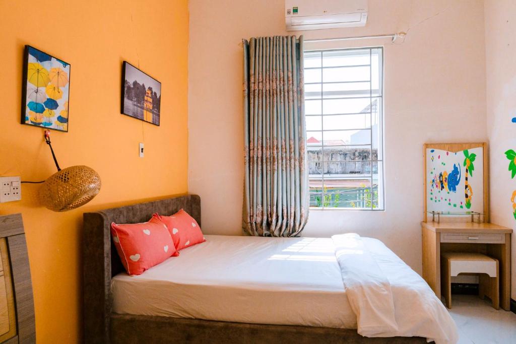 Postel nebo postele na pokoji v ubytování Ruby Homestay Phú Yên