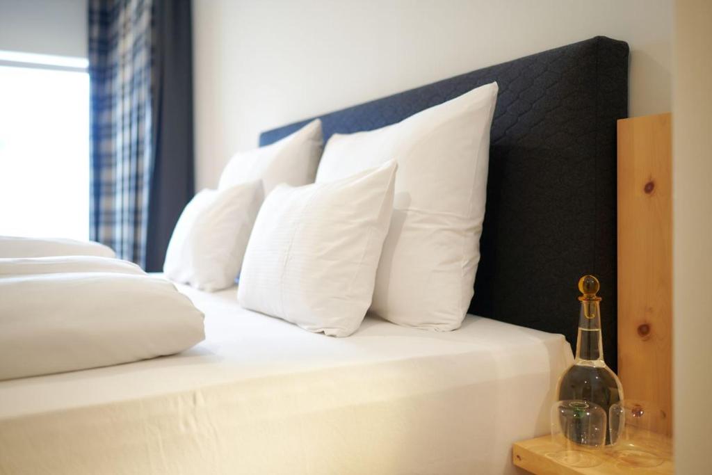 Postel nebo postele na pokoji v ubytování Hotel Der Einrichter