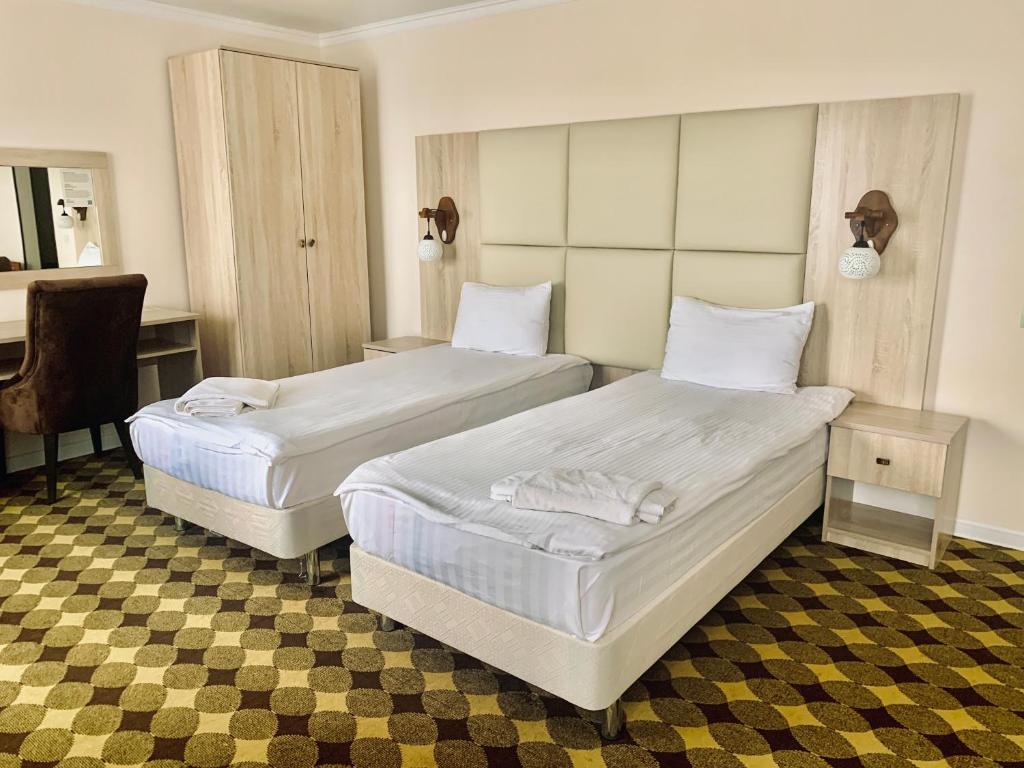 Dostyq Kokshetau - Habitación Triple Superior