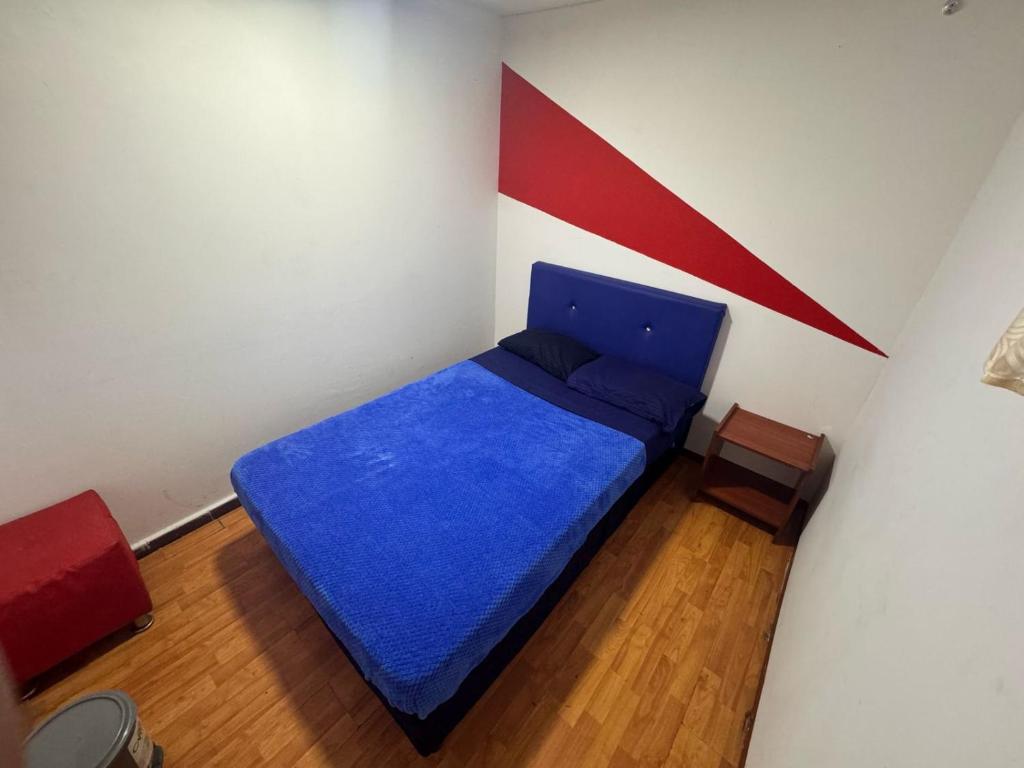 Postel nebo postele na pokoji v ubytování Hostel Bogotá Niza Tu sitio