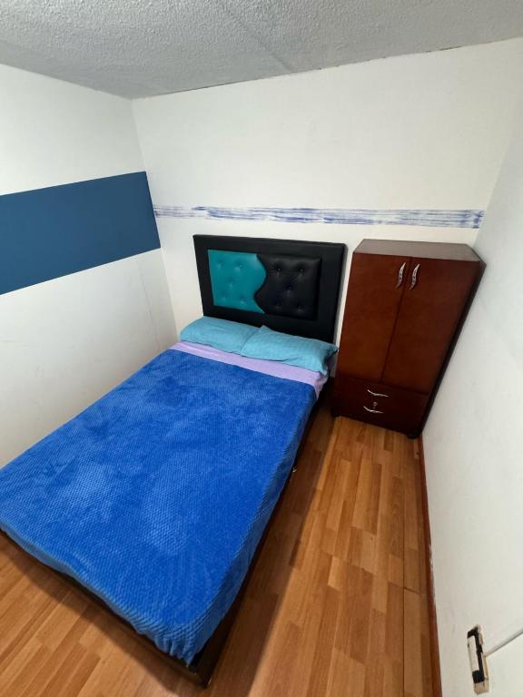 Postel nebo postele na pokoji v ubytování Hostel Bogotá Niza Tu sitio