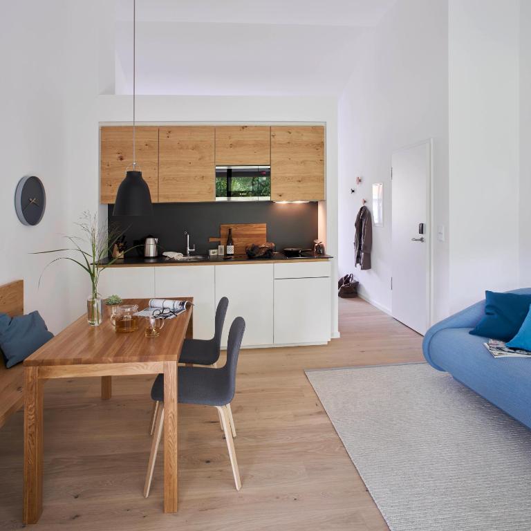Kuchyň nebo kuchyňský kout v ubytování meinwolfsburg hotel auf dem rittergut vormals Yard Boarding Hotel