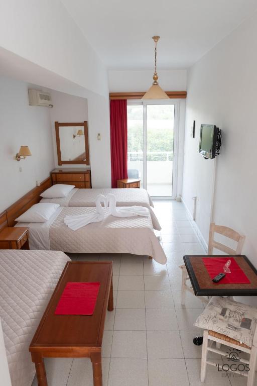Postel nebo postele na pokoji v ubytování Let it Be Apartments