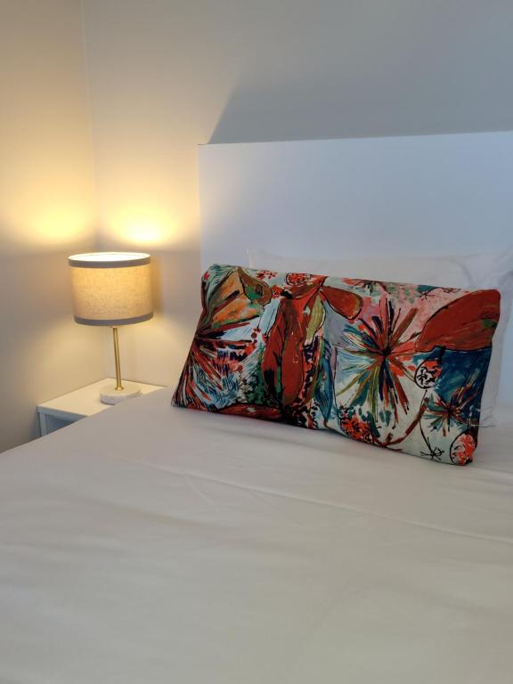 Postel nebo postele na pokoji v ubytování Hôtel Port Haliguen