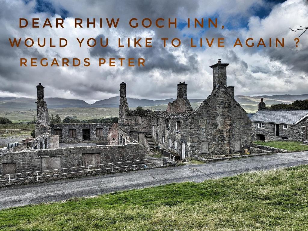an old stone building with a quote about death rhymes coughinwould you at Grade II Lodge House 2 Bedroom in Trawsfynydd
