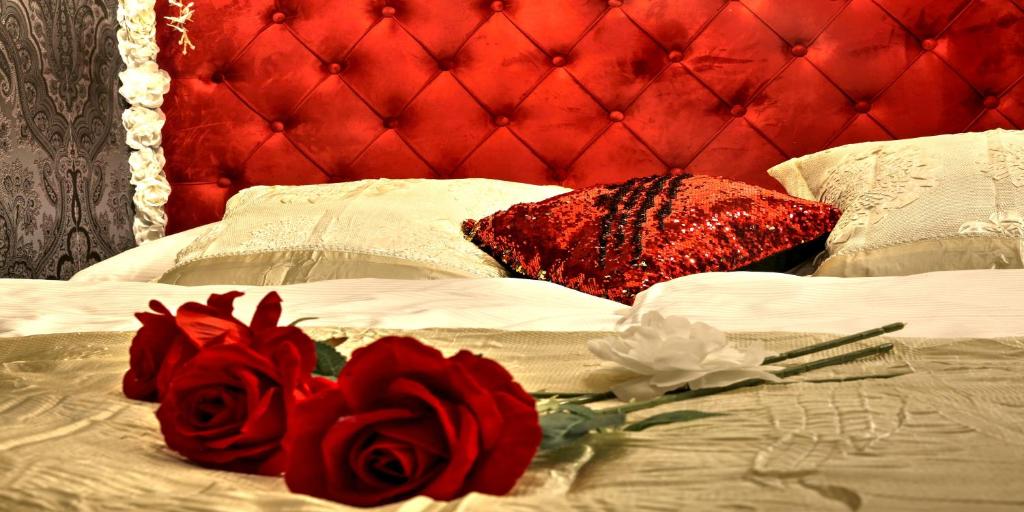 Postel nebo postele na pokoji v ubytování Ferrari wellness apartmán