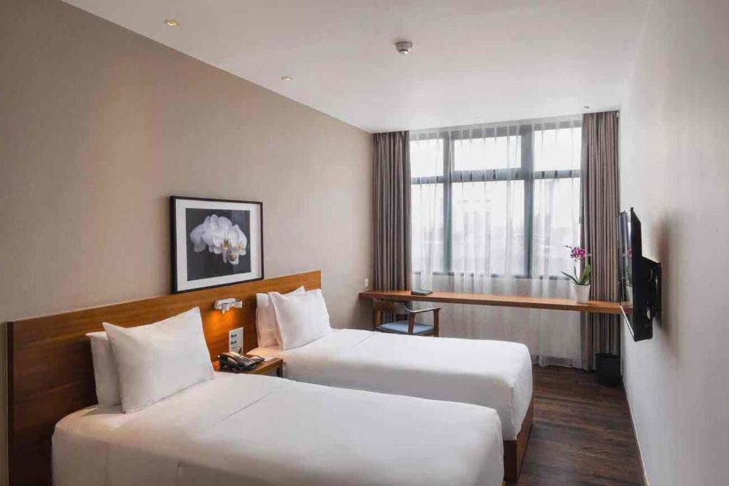 TV a/nebo společenská místnost v ubytování Veranda Serviced Residence Puri