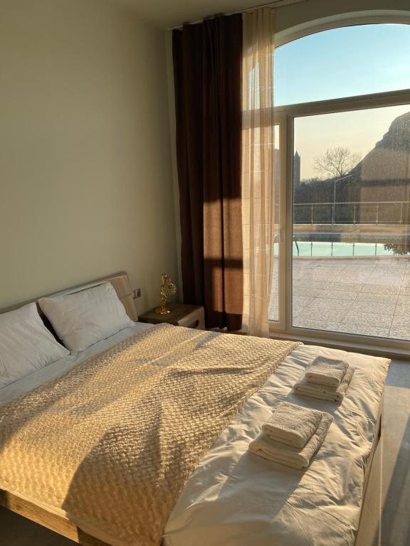 Postel nebo postele na pokoji v ubytování Dream sea apartment 2