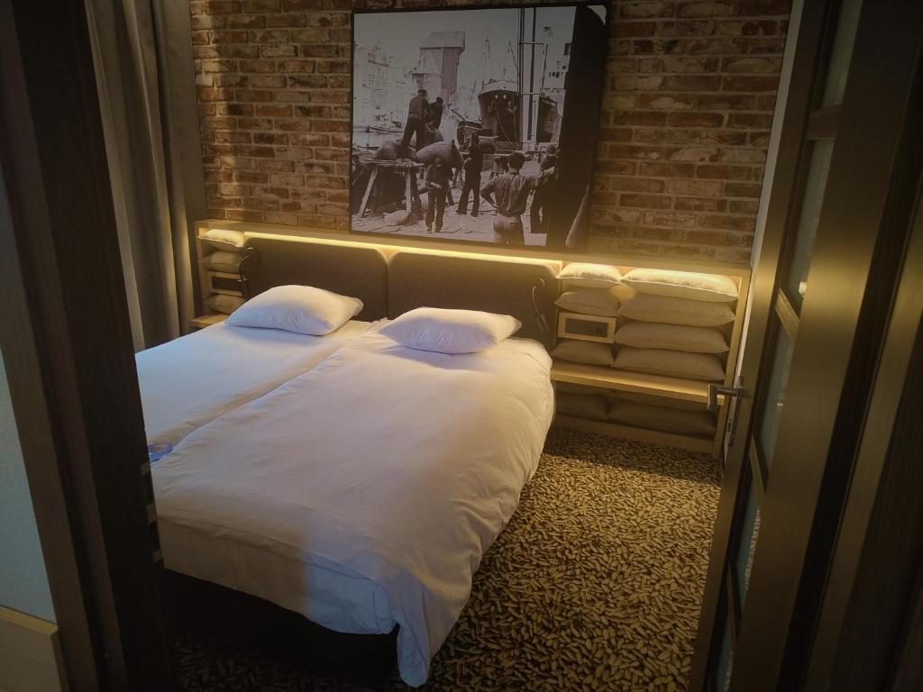 Posteľ alebo postele v izbe v ubytovaní Qubus Hotel Gdańsk