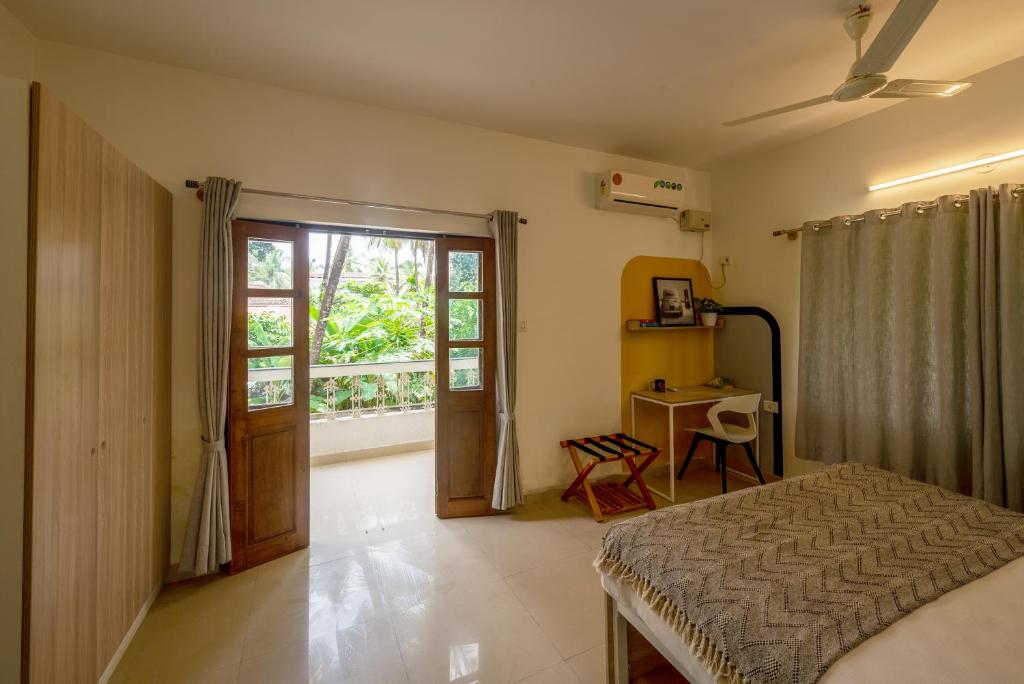 Postel nebo postele na pokoji v ubytování Olive Hotel Calangute Niwasa by Embassy Group