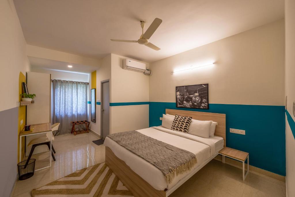 Postel nebo postele na pokoji v ubytování Olive Hotel Calangute Niwasa by Embassy Group