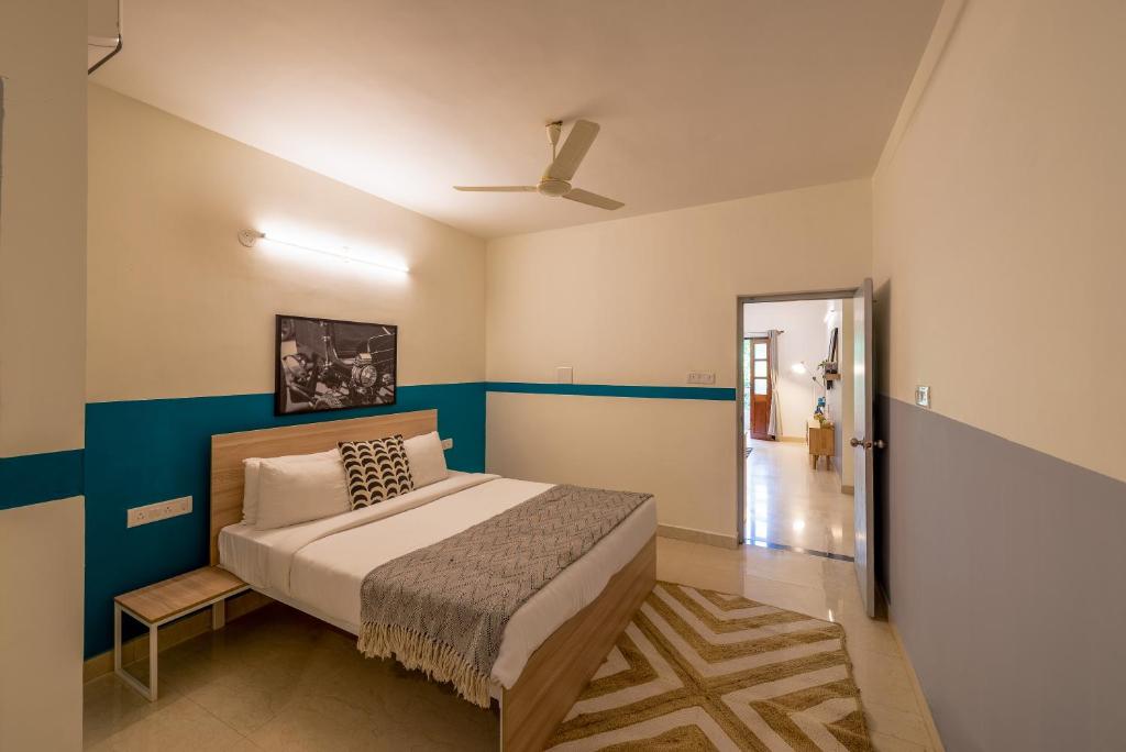 Postel nebo postele na pokoji v ubytování Olive Hotel Calangute Niwasa by Embassy Group