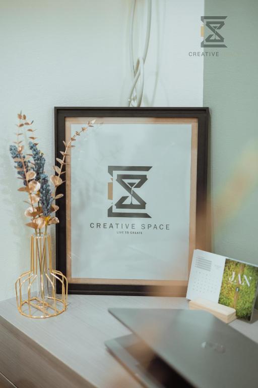 Majutusasutuses CreativeSpace-Mactan2 olev sertifikaat, autasu, silt või muu dokument