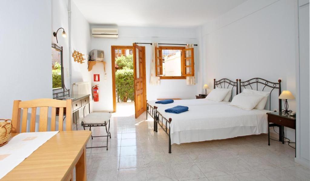 Postel nebo postele na pokoji v ubytování Anniska Hotel