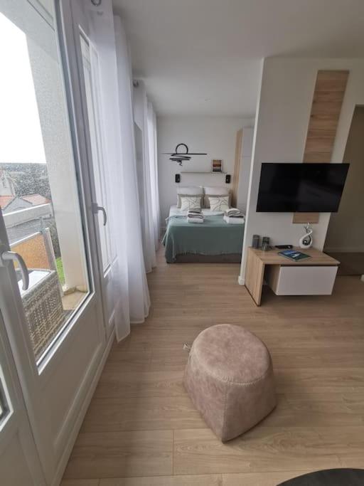 Postel nebo postele na pokoji v ubytování Le Stoubenn, raffiné et chaleureux
