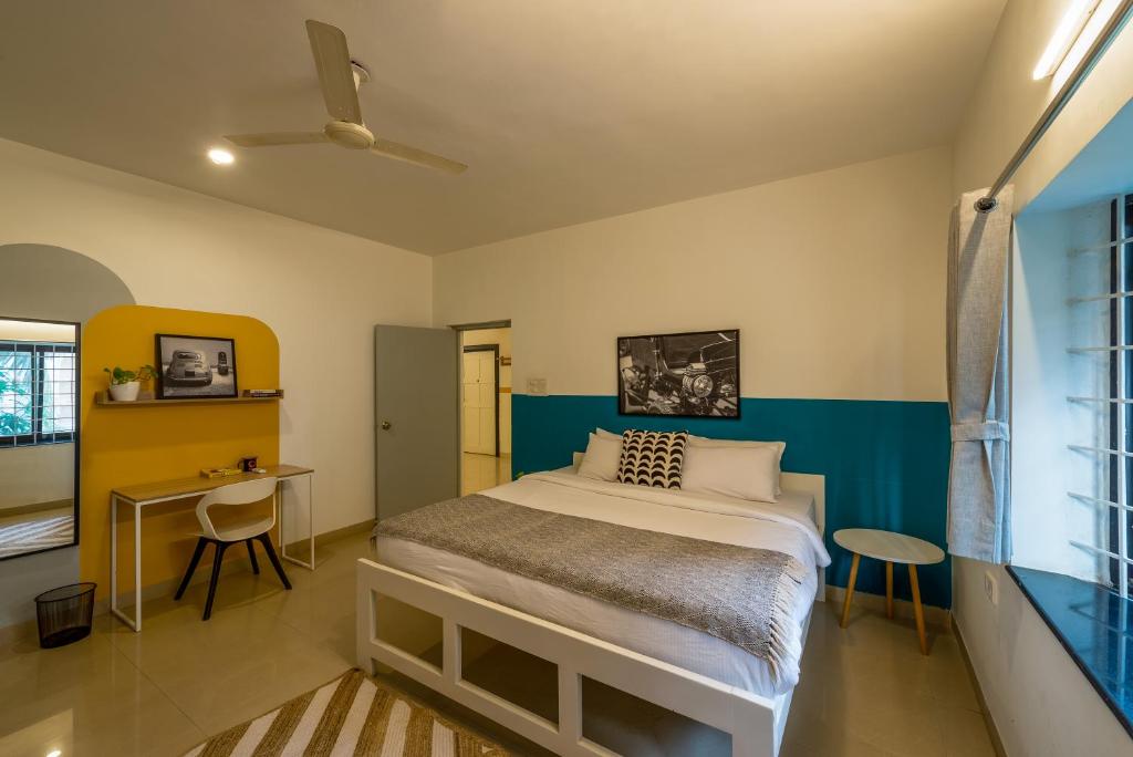 Postel nebo postele na pokoji v ubytování Olive Hotel Calangute Niwasa by Embassy Group