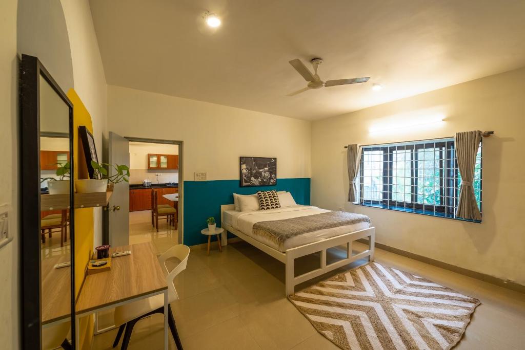 Postel nebo postele na pokoji v ubytování Olive Hotel Calangute Niwasa by Embassy Group