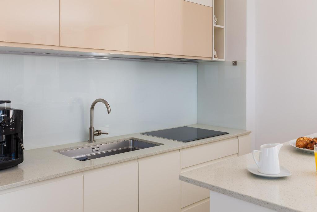 Kuchyňa alebo kuchynka v ubytovaní A&D Deluxe Penthouse Apartment Dani