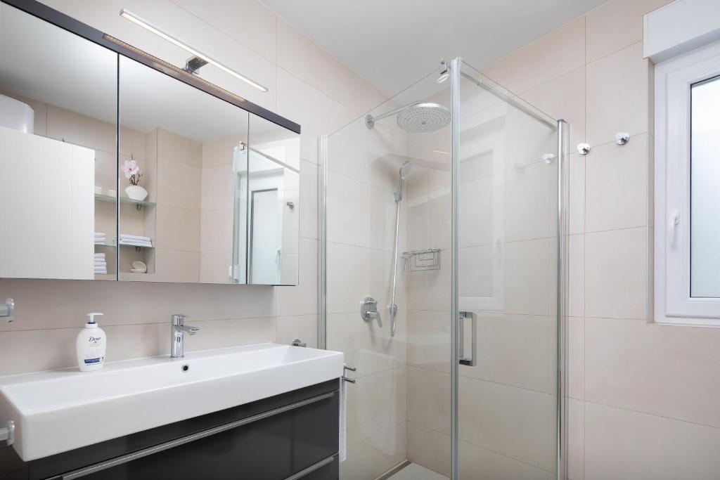 Kúpeľňa v ubytovaní A&D Deluxe Penthouse Apartment Dani