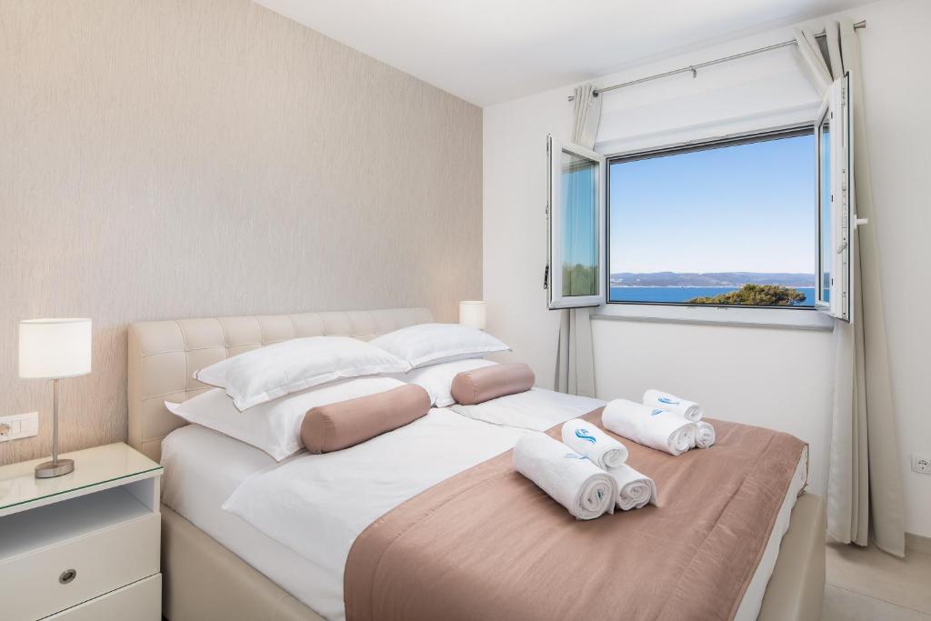 Posteľ alebo postele v izbe v ubytovaní A&D Deluxe Penthouse Apartment Dani