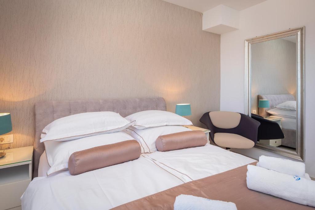 Posteľ alebo postele v izbe v ubytovaní A&D Deluxe Penthouse Apartment Dani