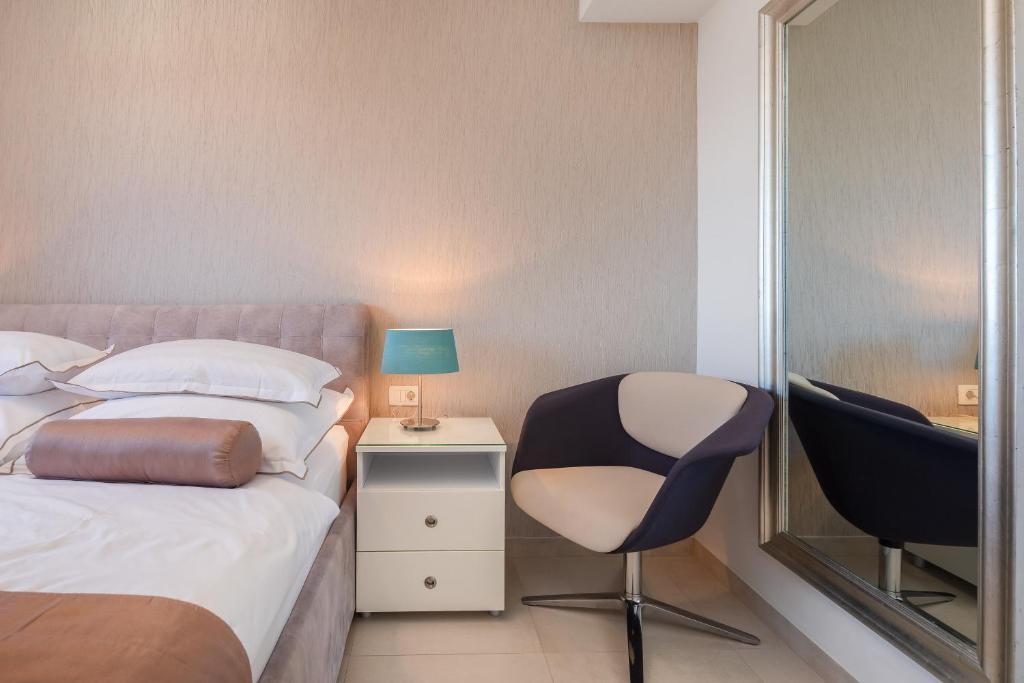 Posteľ alebo postele v izbe v ubytovaní A&D Deluxe Penthouse Apartment Dani