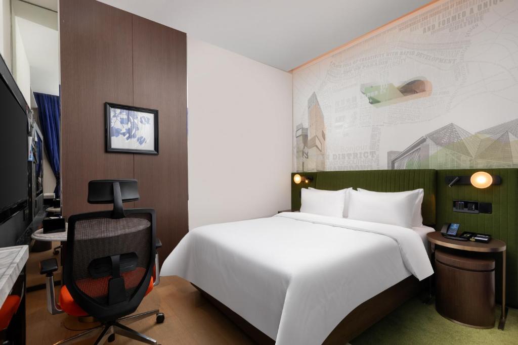 TV a/nebo společenská místnost v ubytování Hampton by Hilton Shenzhen Nanshan Science and Technology Park