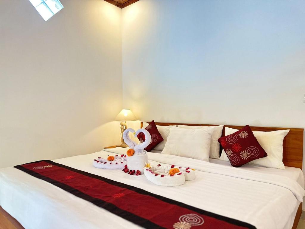 Postel nebo postele na pokoji v ubytování Bupon house cempaka room
