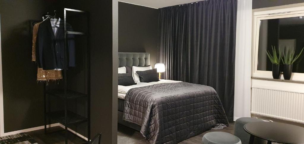 Postel nebo postele na pokoji v ubytování Hotell Iföhus