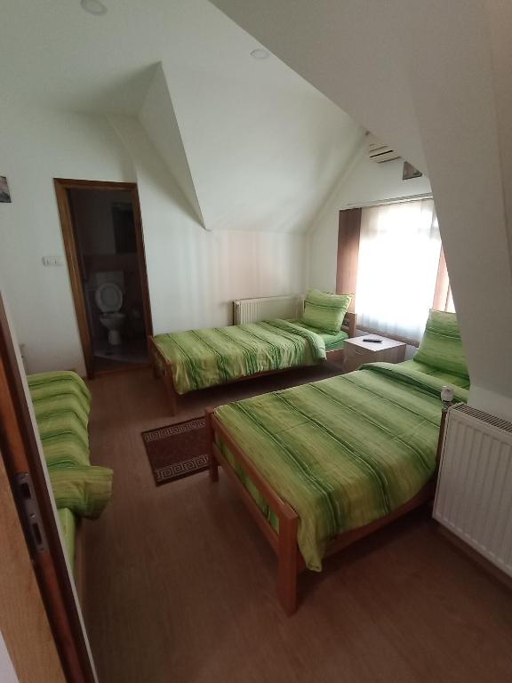 Postel nebo postele na pokoji v ubytování ART-2 sobe