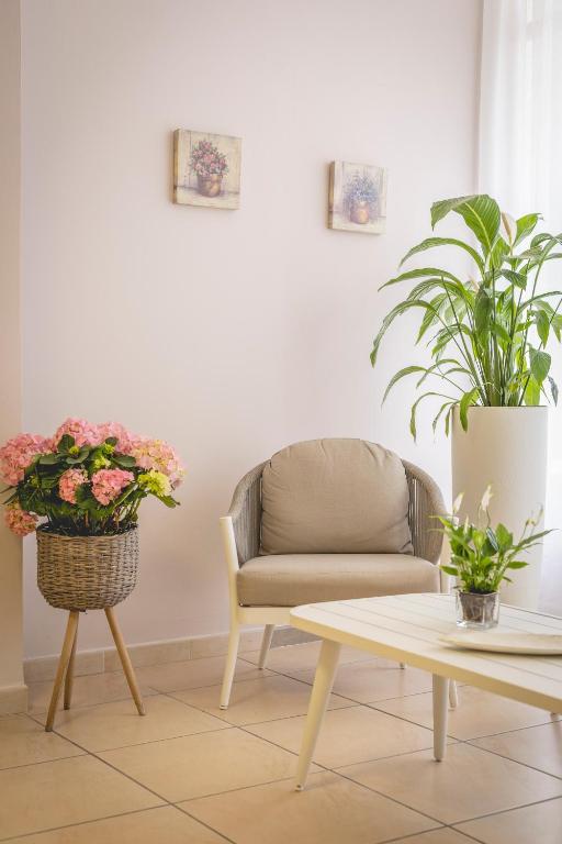 Posezení v ubytování Hotel La Perla