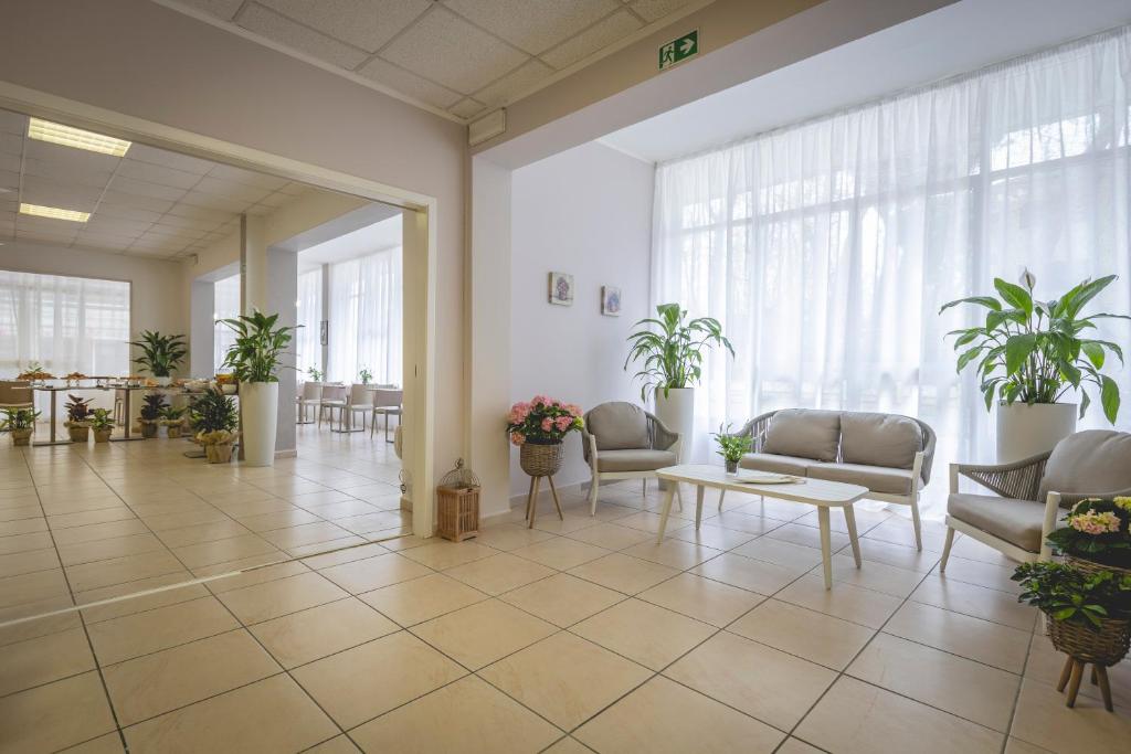 Posezení v ubytování Hotel La Perla