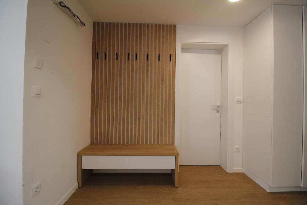 Postel nebo postele na pokoji v ubytování Naia Apartments