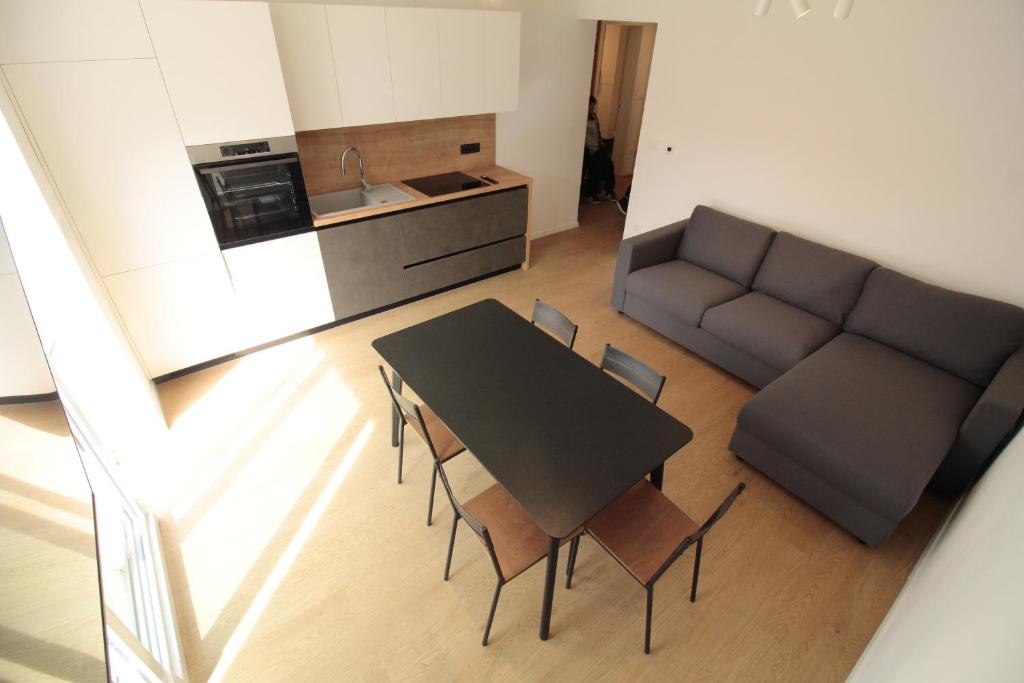 Kuchyň nebo kuchyňský kout v ubytování Naia Apartments