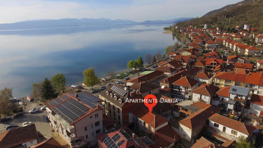 an aerial view of a town next to a body of water at Apartments Darija in Peštani
