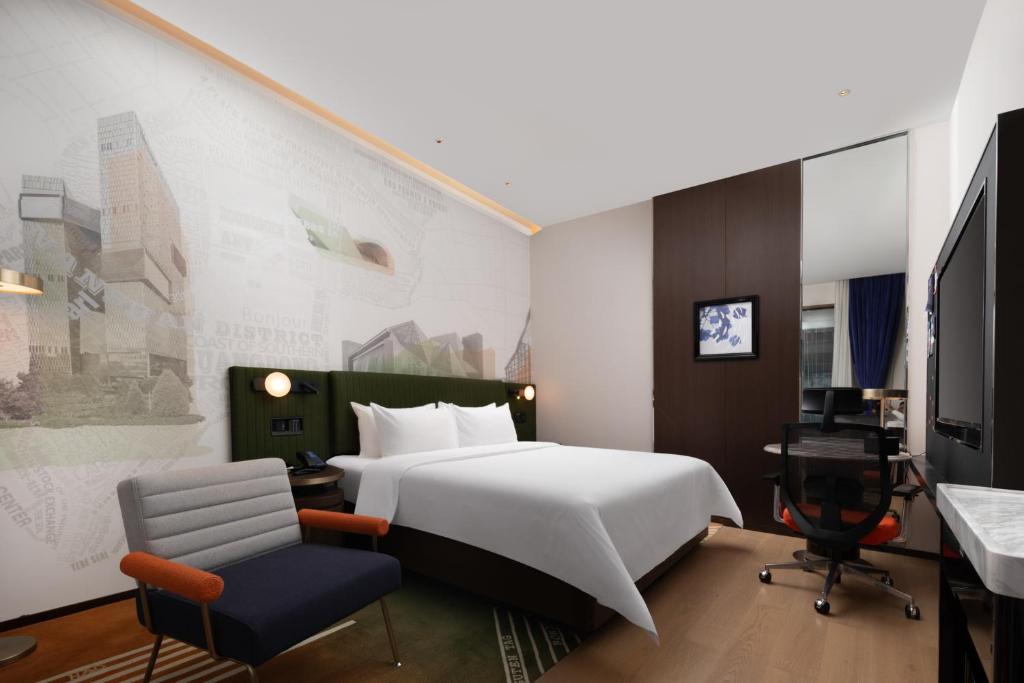 TV a/nebo společenská místnost v ubytování Hampton by Hilton Shenzhen Nanshan Science and Technology Park