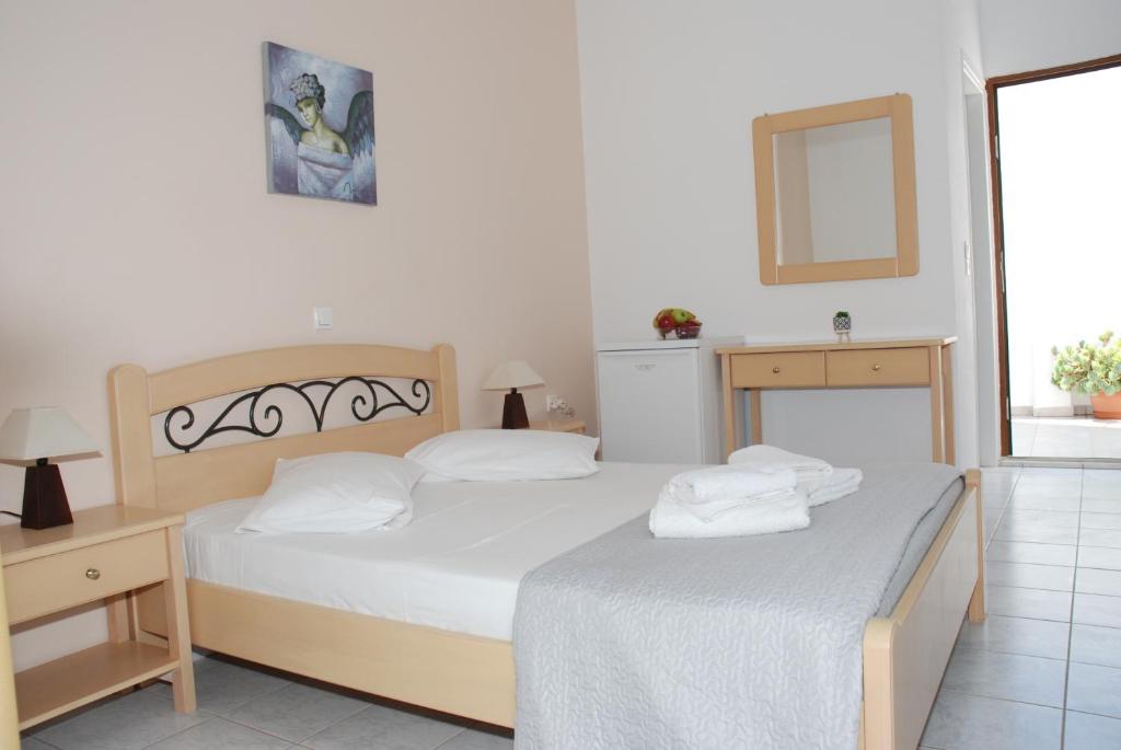 Postel nebo postele na pokoji v ubytování PANORAMA STUDIOS